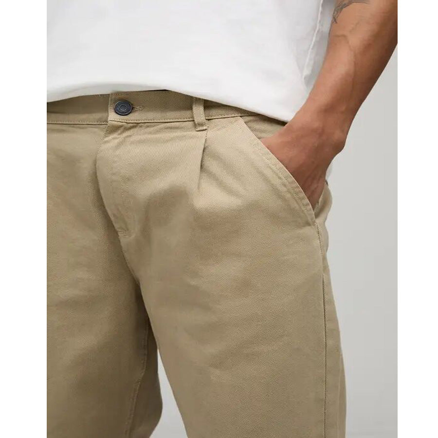 Men’s taupe wide-leg jeans with relaxed fit and neutral tone