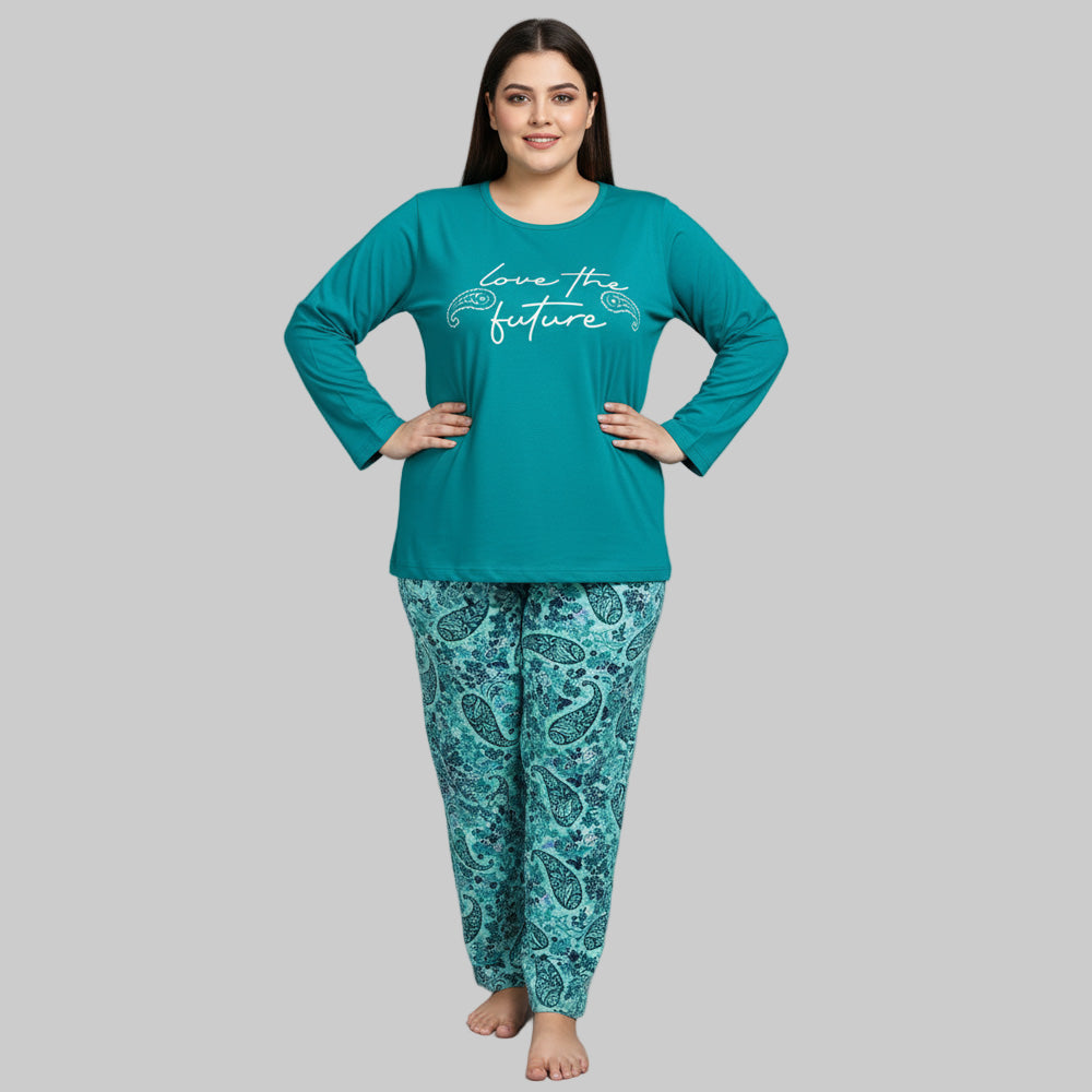 Plus-size woman wearing a teal long-sleeve pajama top with “Love the Future” print and teal paisley pajama bottoms — cozy cotton-blend sleepwear set.