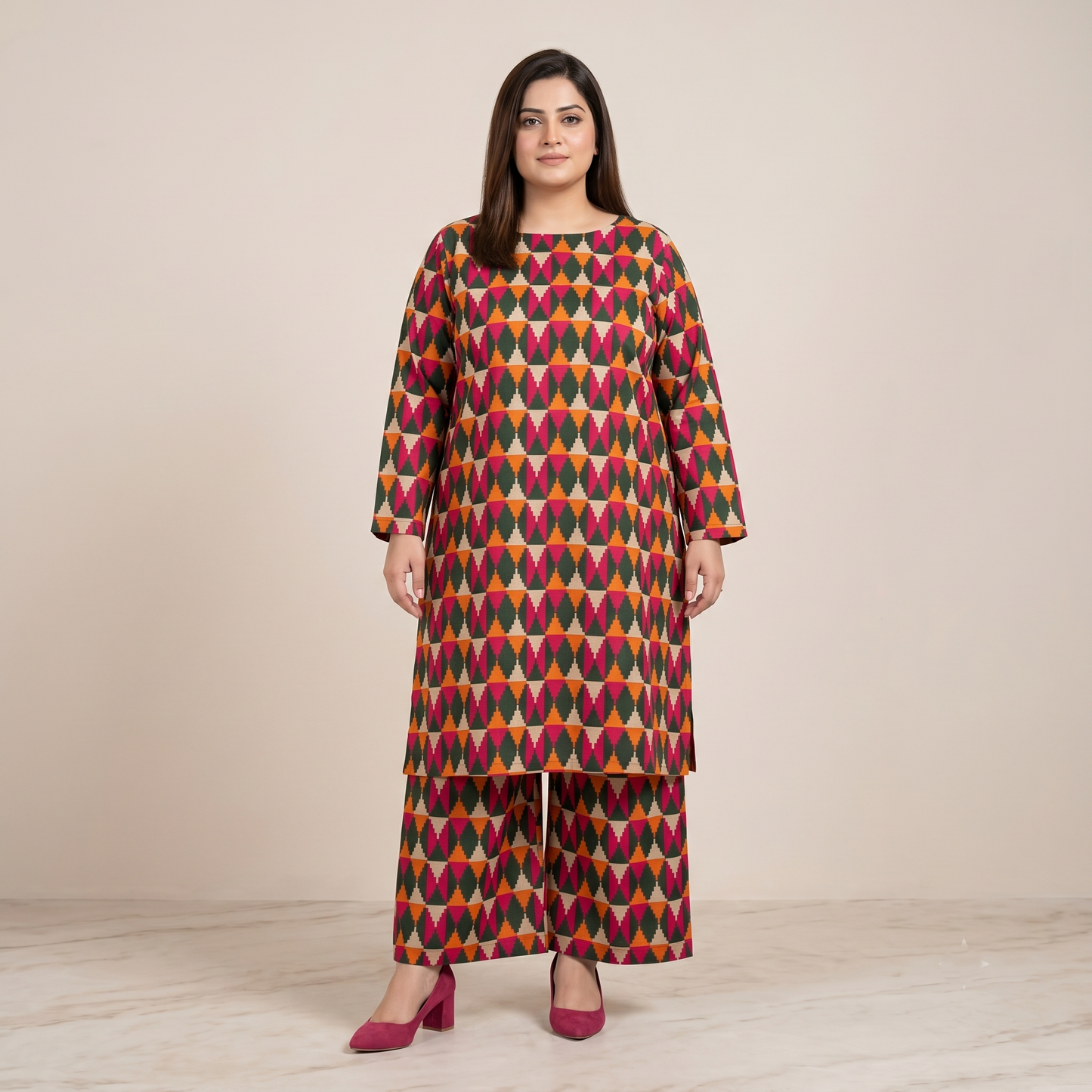 Woman wearing a colorful patterned outfit on a plain background