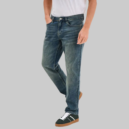 Washed blue regular fit denim jeans for men, classic five-pocket style, mid-rise waist, zip fly closure, straight leg design, soft faded wash finish, comfortable everyday casual wear, plus size friendly fit.