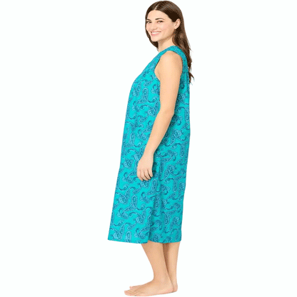 Sleeveless cotton lounger in a colorful waterfall paisley print, featuring a relaxed mid-length fit, shirred yoke detail, and front patch pockets.