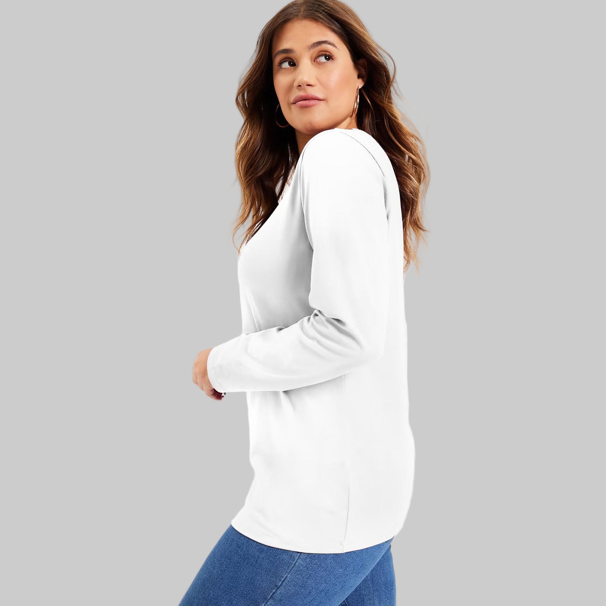 Women’s white long-sleeve crewneck tee made from soft stretch cotton, displayed flat on a white background.