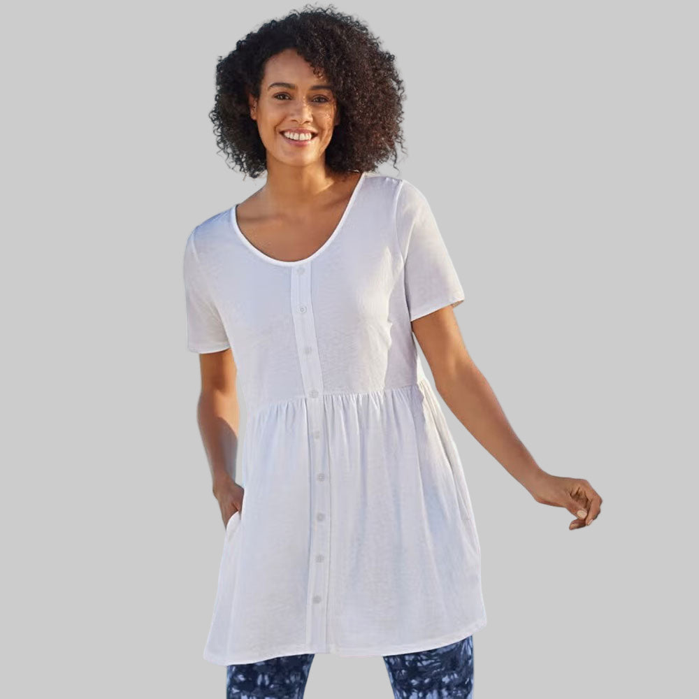 White short-sleeve tunic for women with empire waist and flowy, flattering fit