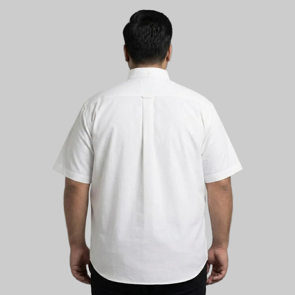 Men's white casual short sleeve button-down shirt with classic collar and front button closure laid flat on a white background.