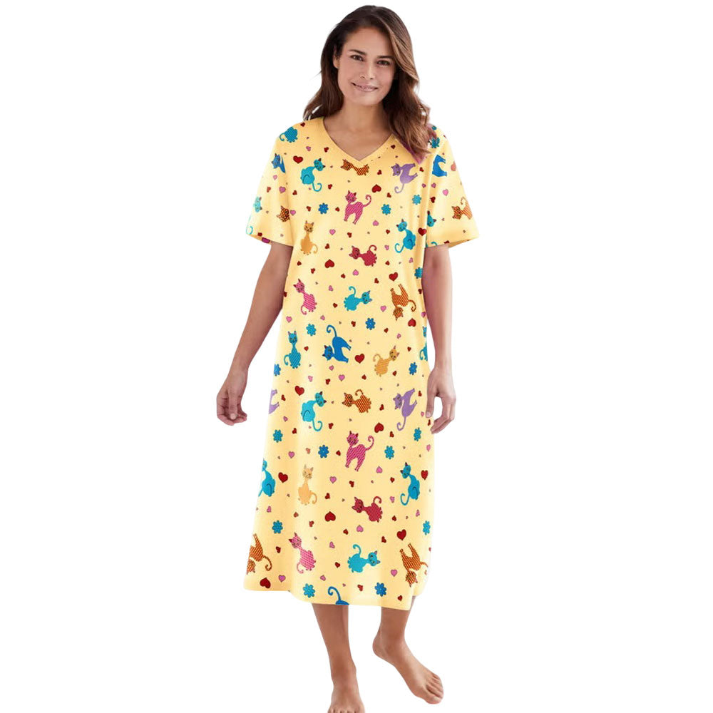 Plus size woman wearing yellow long sleepshirt with playful print
