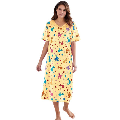 Plus size woman wearing yellow long sleepshirt with playful print
