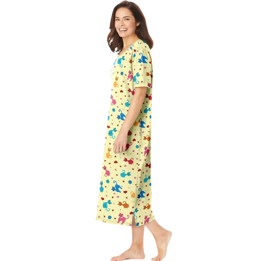 Plus size woman wearing yellow long sleepshirt with playful print
