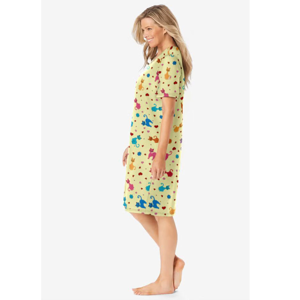 Plus size yellow playful print short sleepshirt in breathable cotton with V-neck, relaxed fit, and 40" coverage.