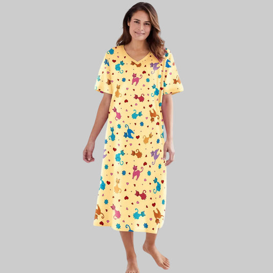 Women's Yellow Play Long Printed B Grade Sleepshirt made from soft cotton-blend fabric with a playful all-over print, relaxed fit, and long-length design, front view.