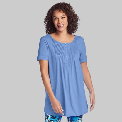 Woman wearing French Blue short sleeve Henley tunic with pintuck chest detail