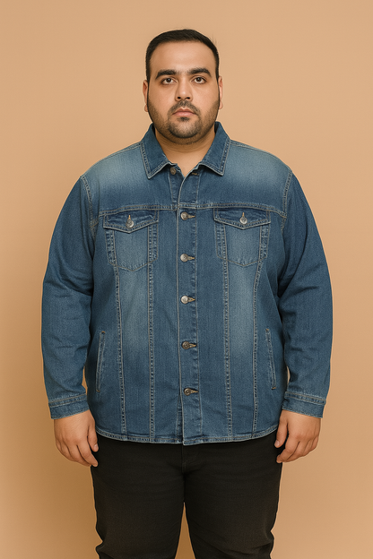 Plus-size man wearing classic blue denim jacket with button front and chest pockets