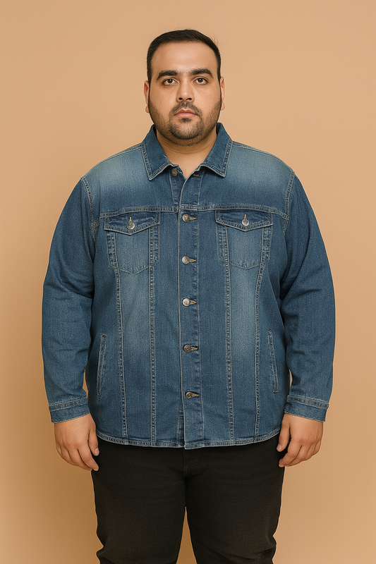 Plus-size man wearing classic blue denim jacket with button front and chest pockets