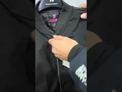 Black plus size bomber jacket with front zip closure and ribbed cuffs displayed on a plain background.