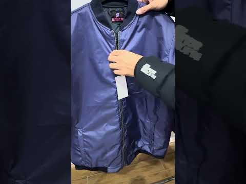 Royal blue plus size bomber jacket with front zip closure and ribbed cuffs on a plain background.
